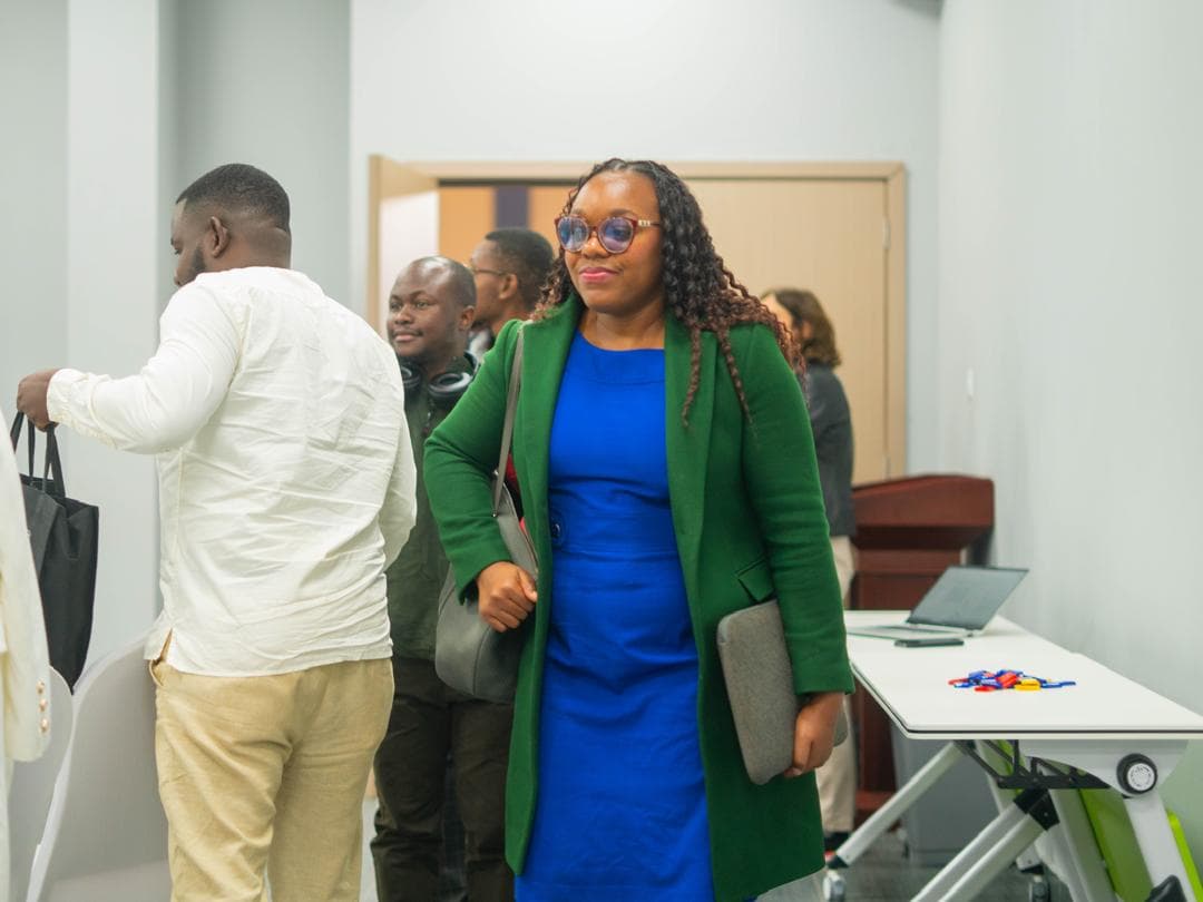 Massi Mapani arriving at a professional technology event